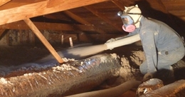 Our technician blowing in cellulose attic insulation