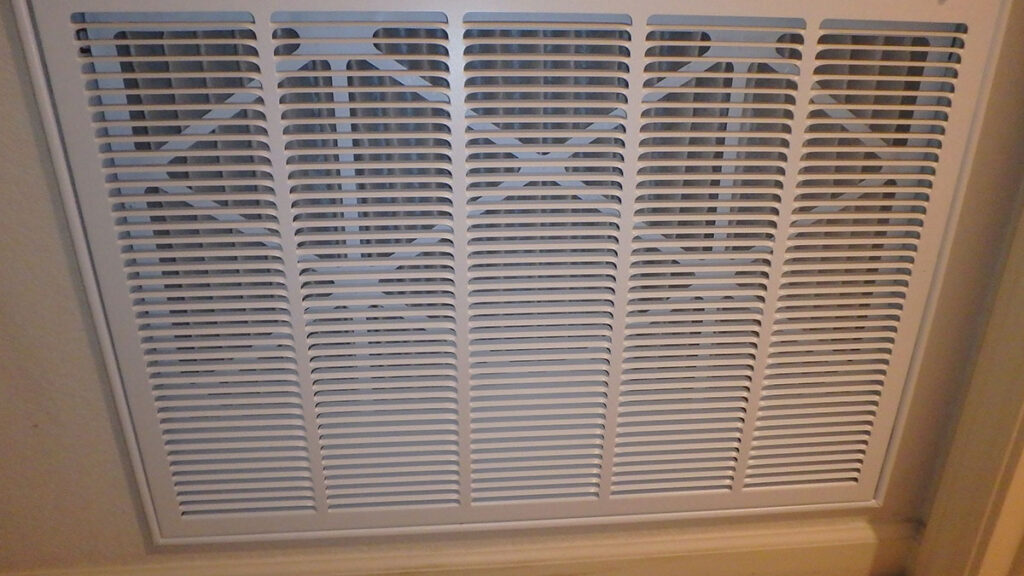 High filtration air filter in housing