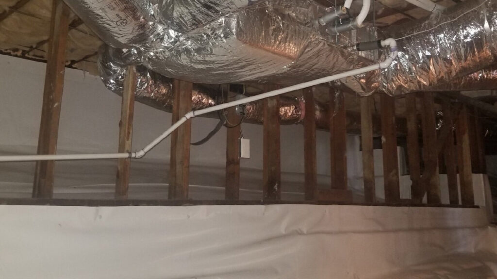 Crawlspace with vapor barrier and sealed and insulated ducting